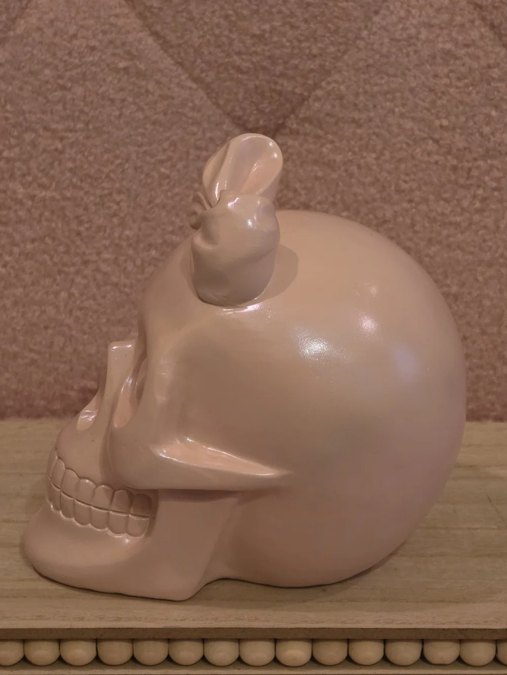 Bow Accent Heart-Eye Skull Figurine in Blush Pink
